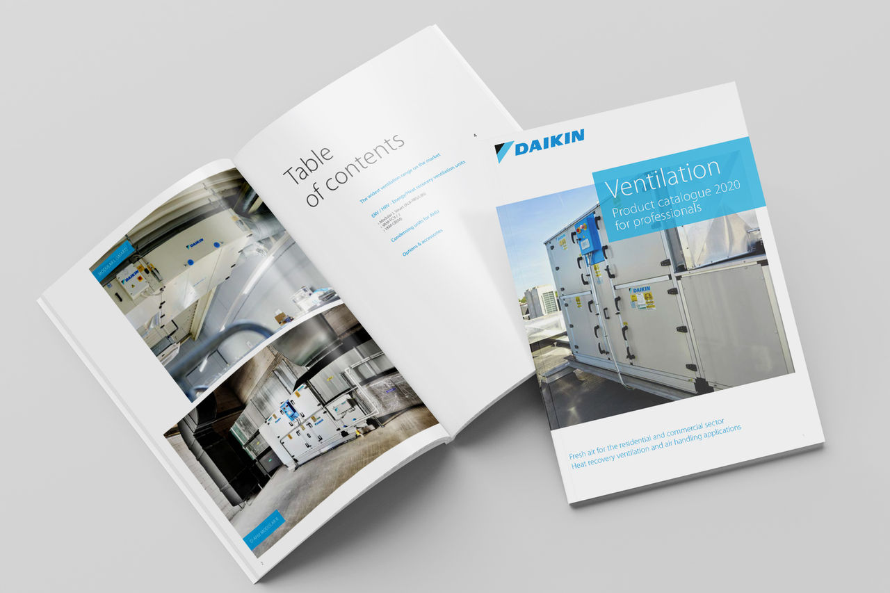 Daikin product catalogues, open and closed.